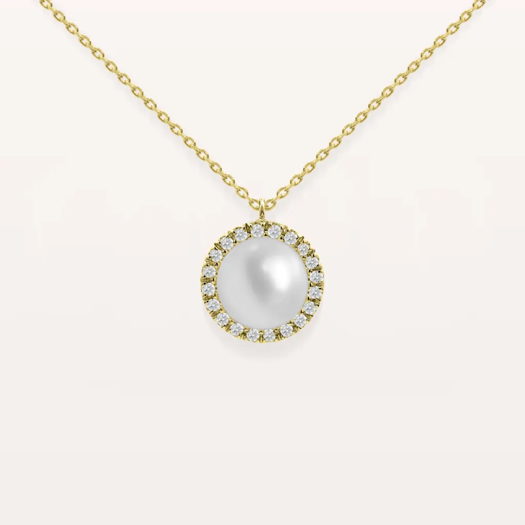 Pendentif perle entouré de diamants
